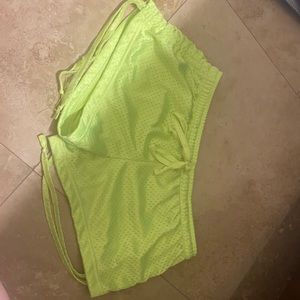 Neon green “St. Augustine Beach” shorts